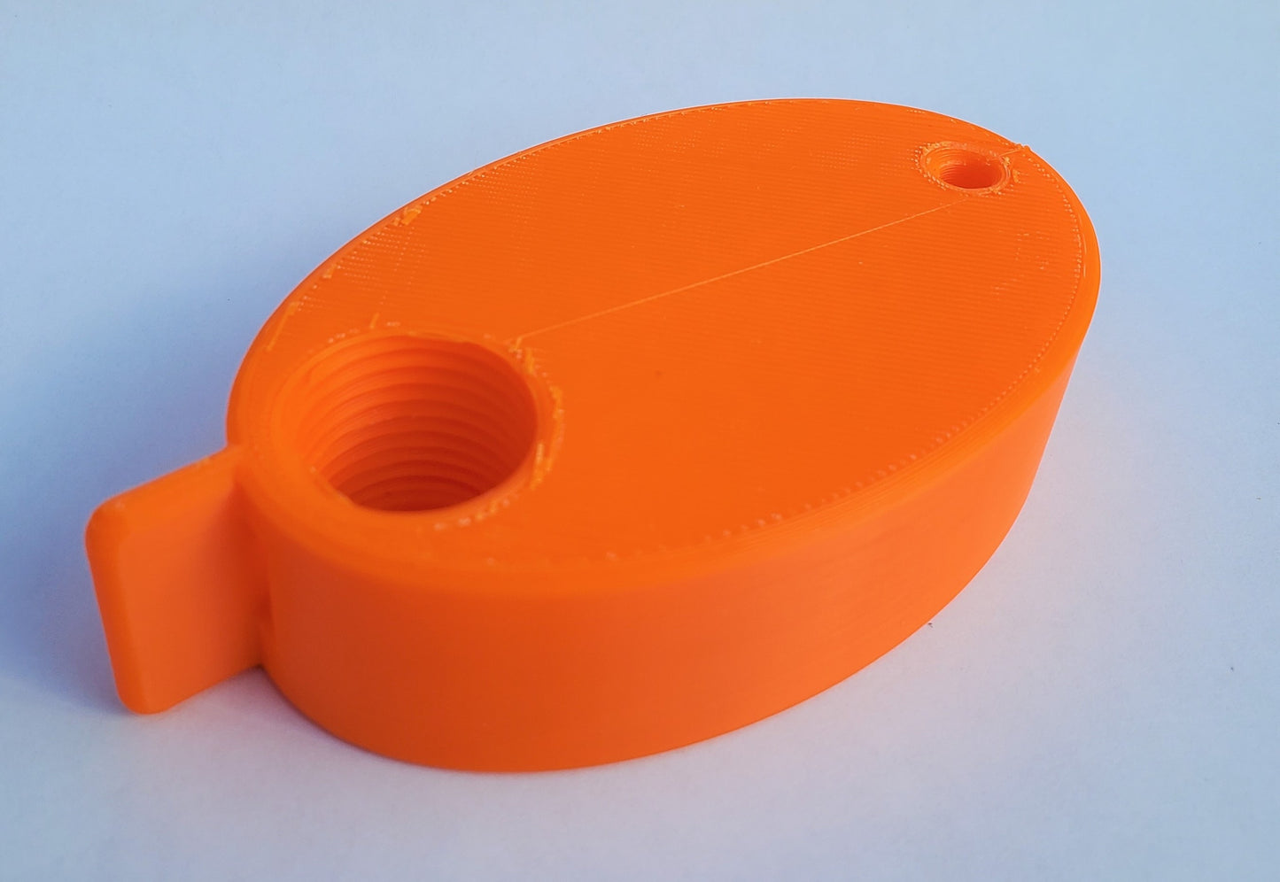 PlugKeyper Plug Float - orange - boat drain plug reminder - key float - locks key in device using plug
